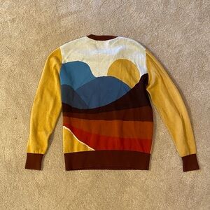 Propaganda Agency mustard sweatshirt with cool design on the back